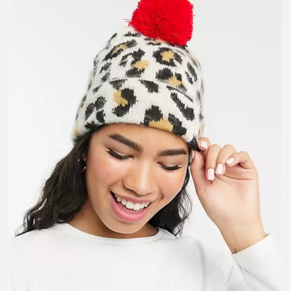 Levi’s leopard print beanie with red pom pom NWT
